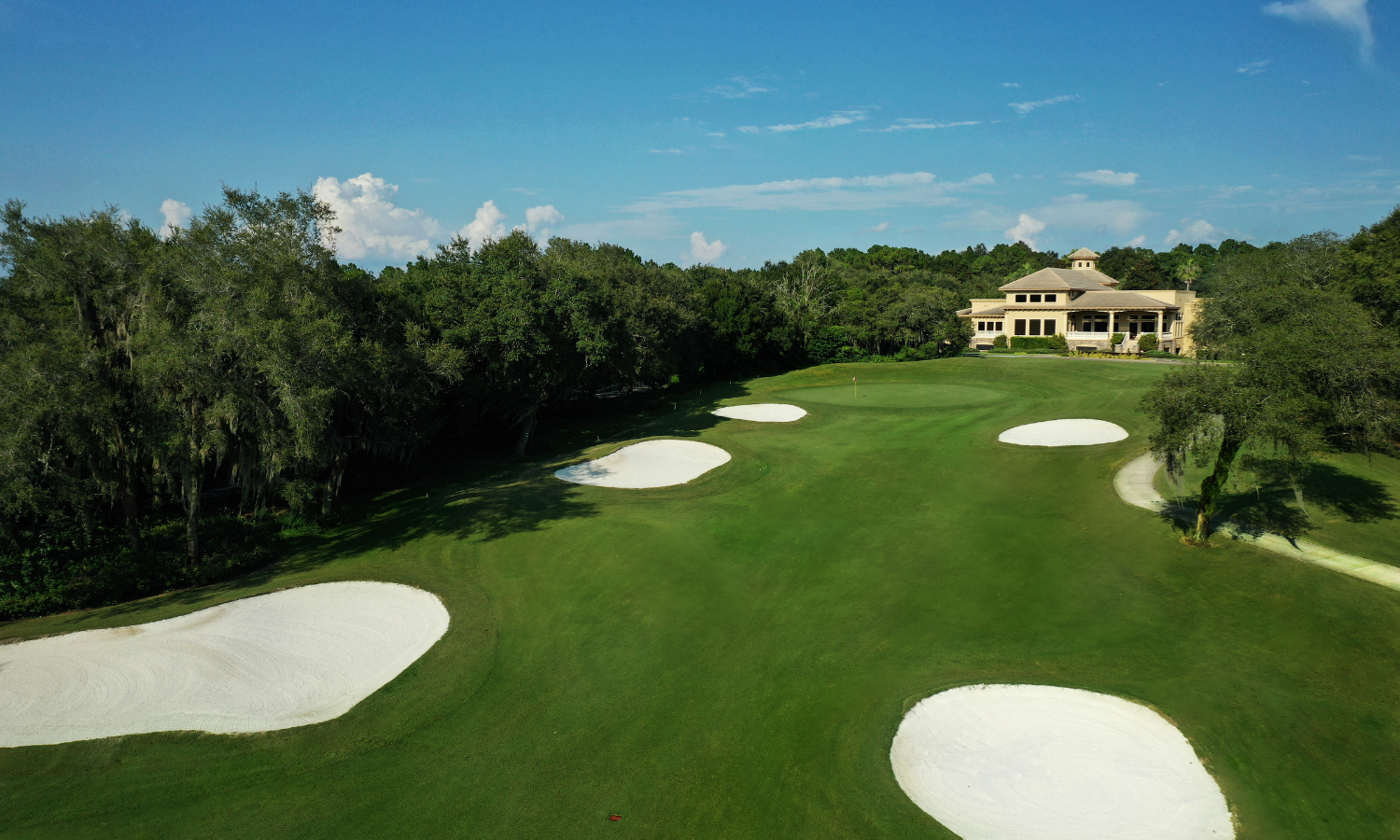 Aerial view of a Citrus Hills fairway leading to the clubhouse